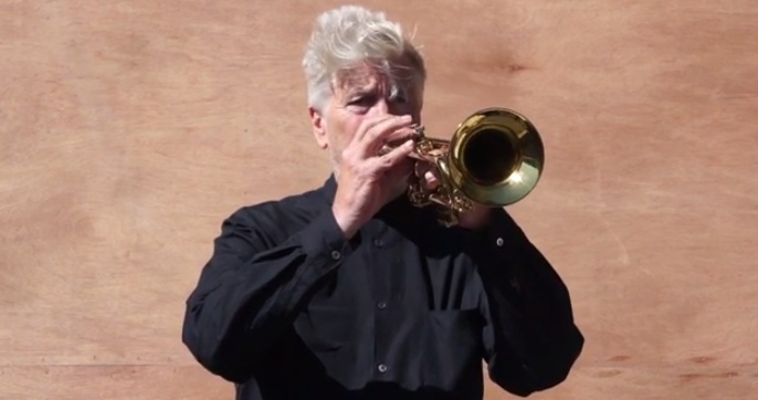 David Lynch adds a Double Shot Express to his Ice Bucket Challenge while Playing ‘Over The Rainbow’ on his Trumpet