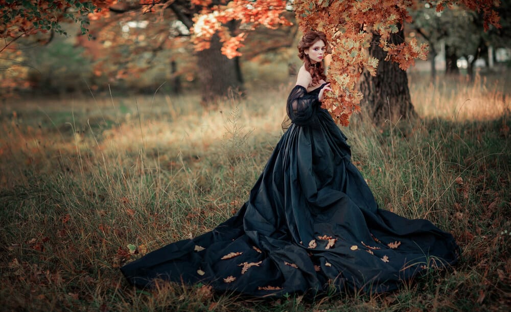 A woman wearing a Gothic gown.