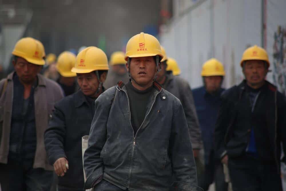 Chinese workers in a mining site.