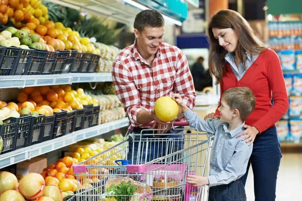 A family is shopping for grocery items.