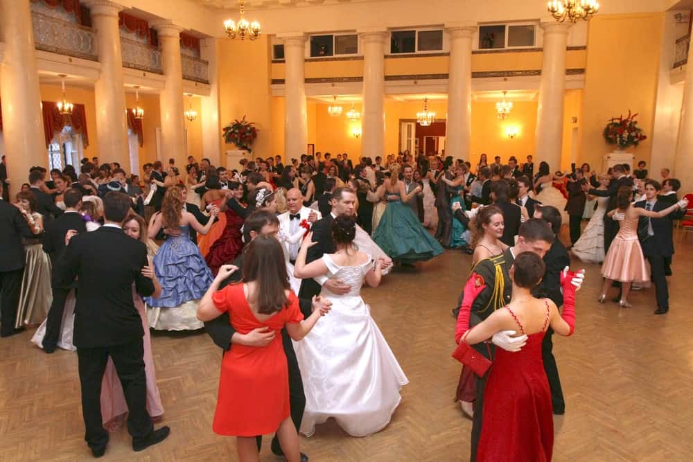 Members of the aristocracy participate in a ball.