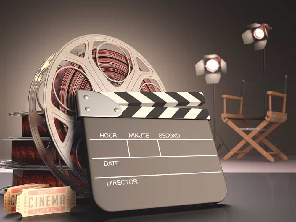Movie reel, action board, movie tickets, lighting, and director's chair.