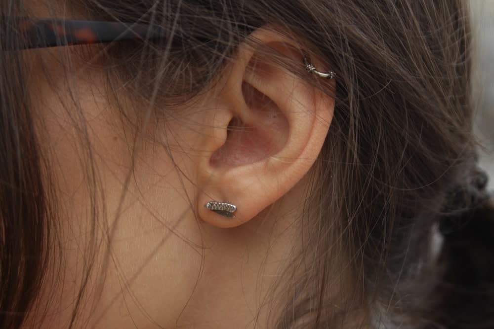 Closeup of a stud earring.