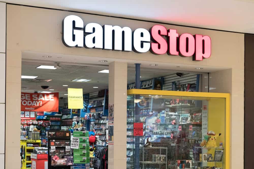 This is a GameStop Store in USA with people shopping. GameStop is an American video game, consumer electronics and wireless services retailer.