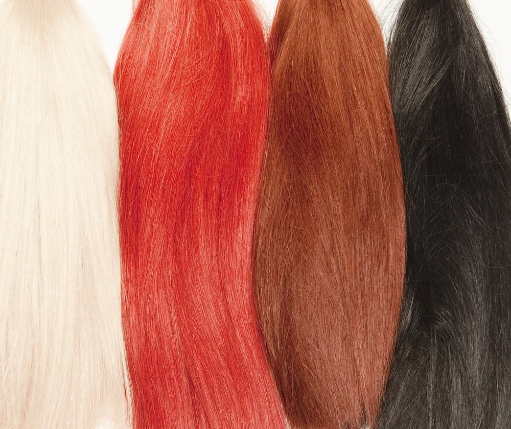 Different colors of real human hair used for wigs.