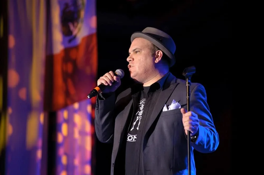 Comedian on stage performing a show