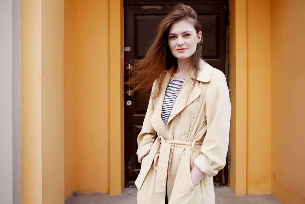 A Beige Trench Coat Sported by a Model