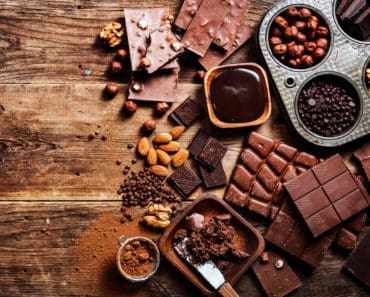 All different types of chocolate on a cutting board