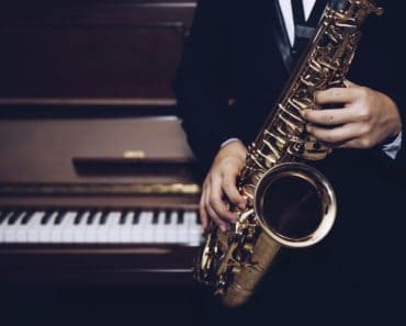 A Saxophonist with a Saxophone in His Hands