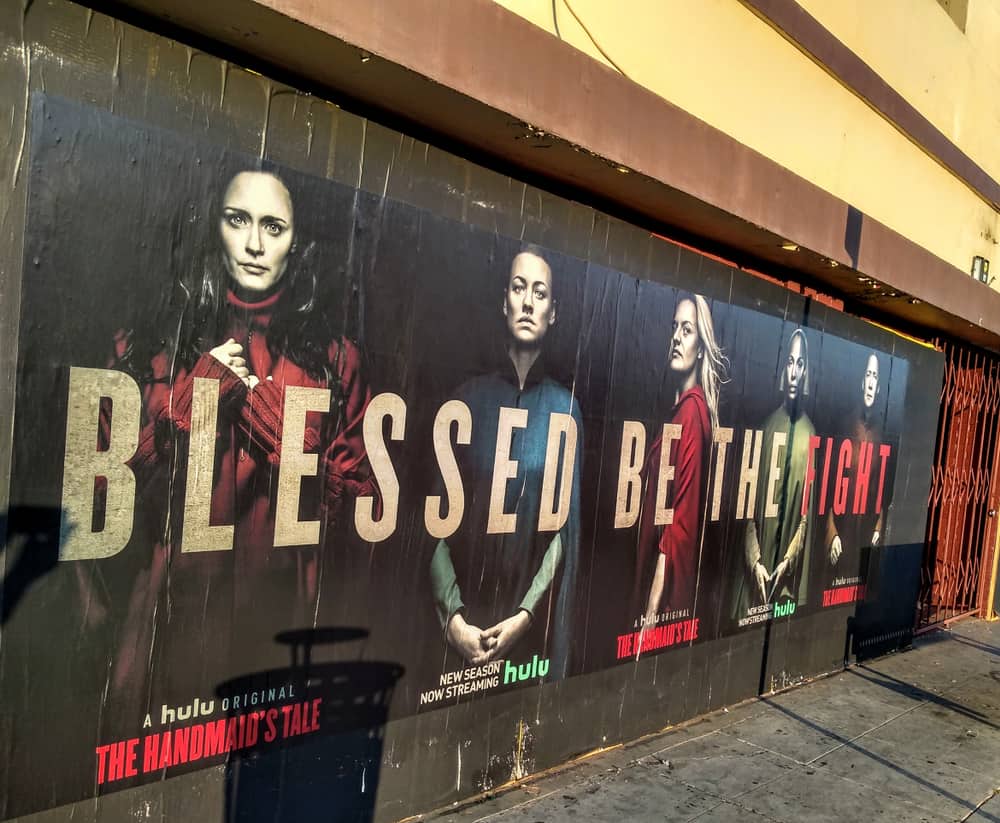 A close look at a street poster for the Handmaid's Tale TV Show.