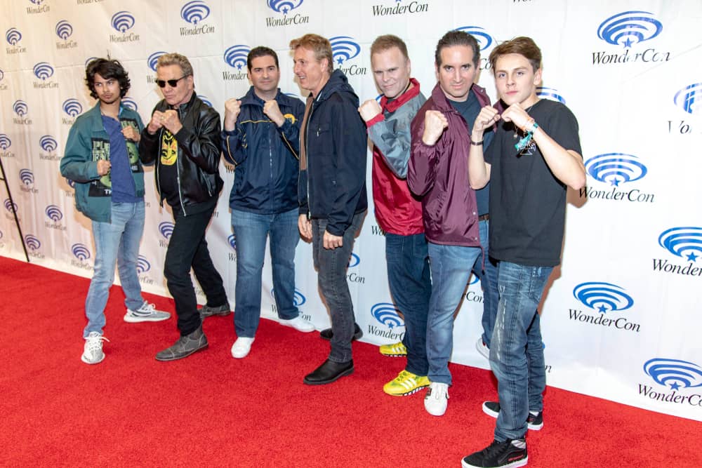 The cast of Cobra Kai together on the red carpet.