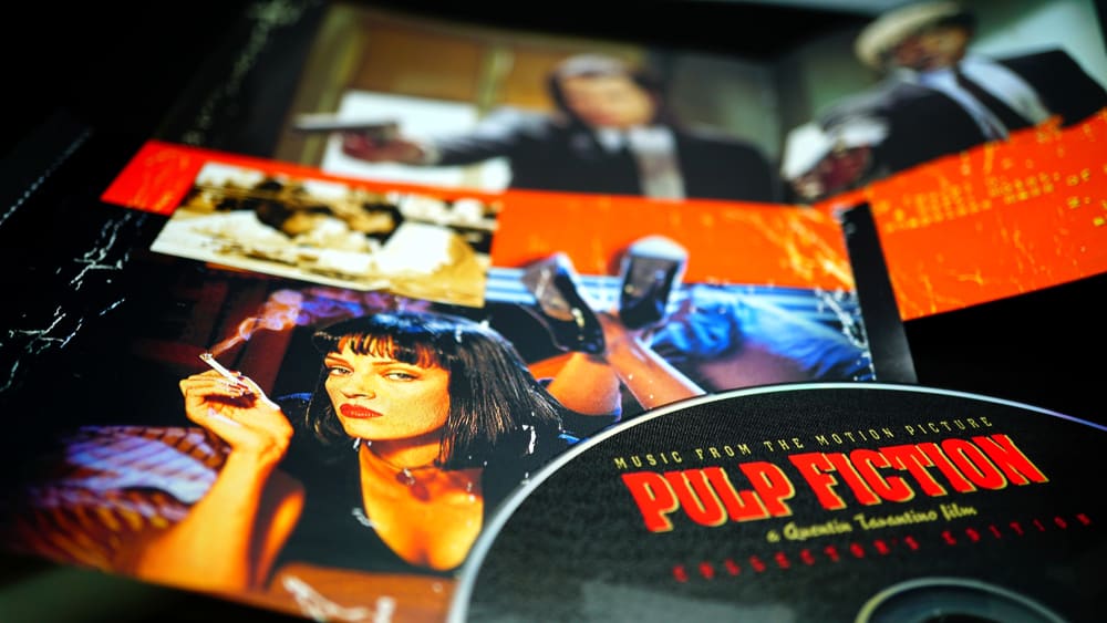 This is a close look at the DVD and the photos from the movie Pulp Fiction.