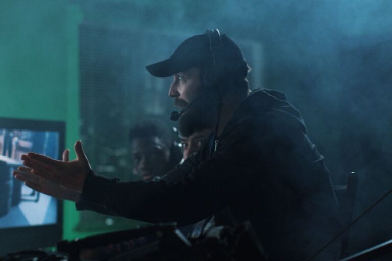 A director scolding actors on set.