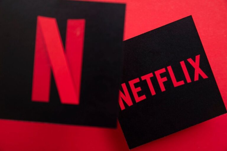 A photo of a Netflix logo and the word Netflix.