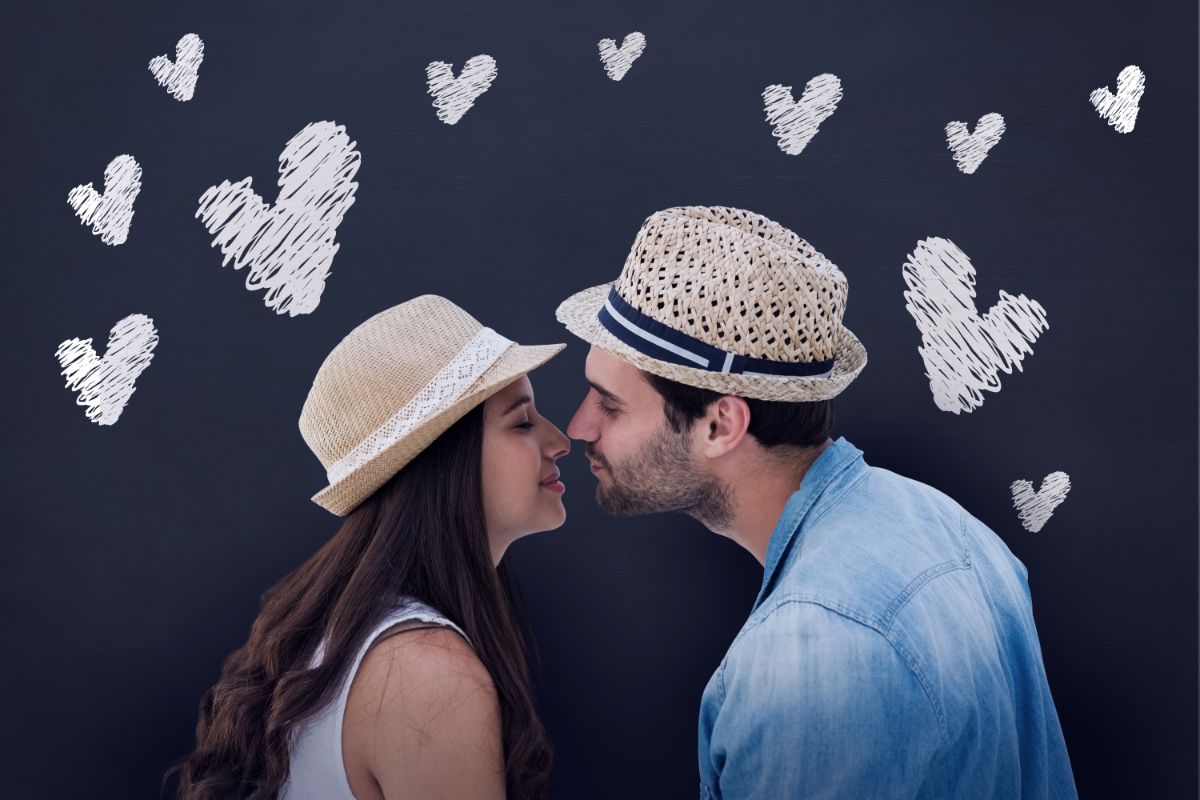 A man and woman about to kiss photo.