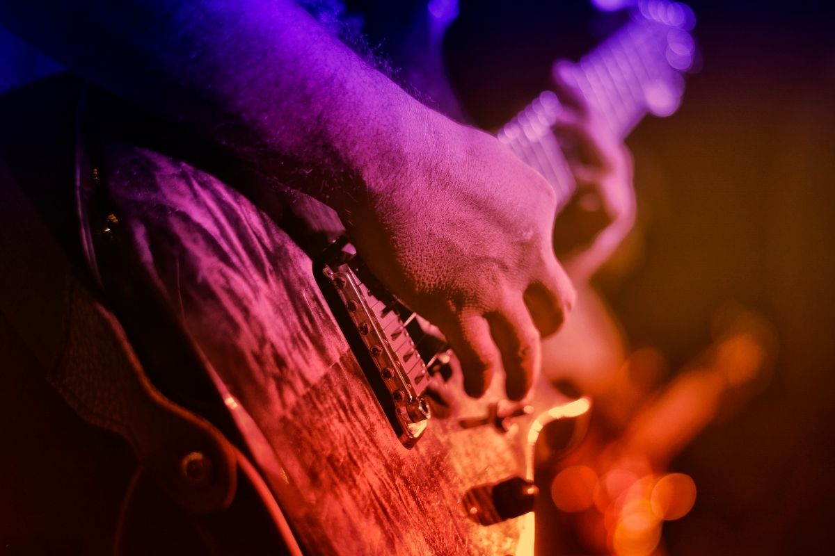 A man playing electric guitar
