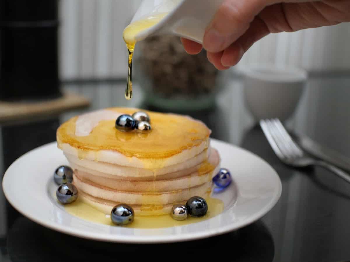 Artisan creating plastic pancakes.