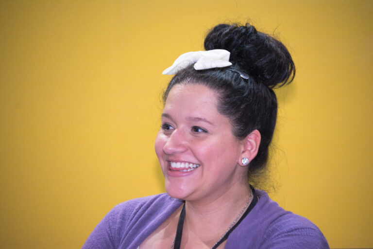Kiera Cass in a yellow background.