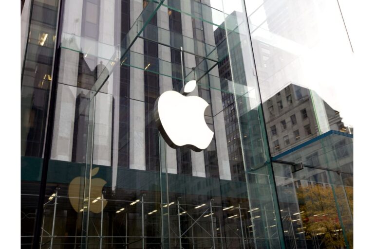 An Apple building with big Apple logo.
