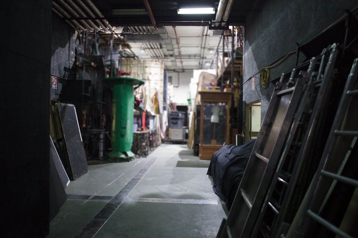 A storage space theater full of props.
